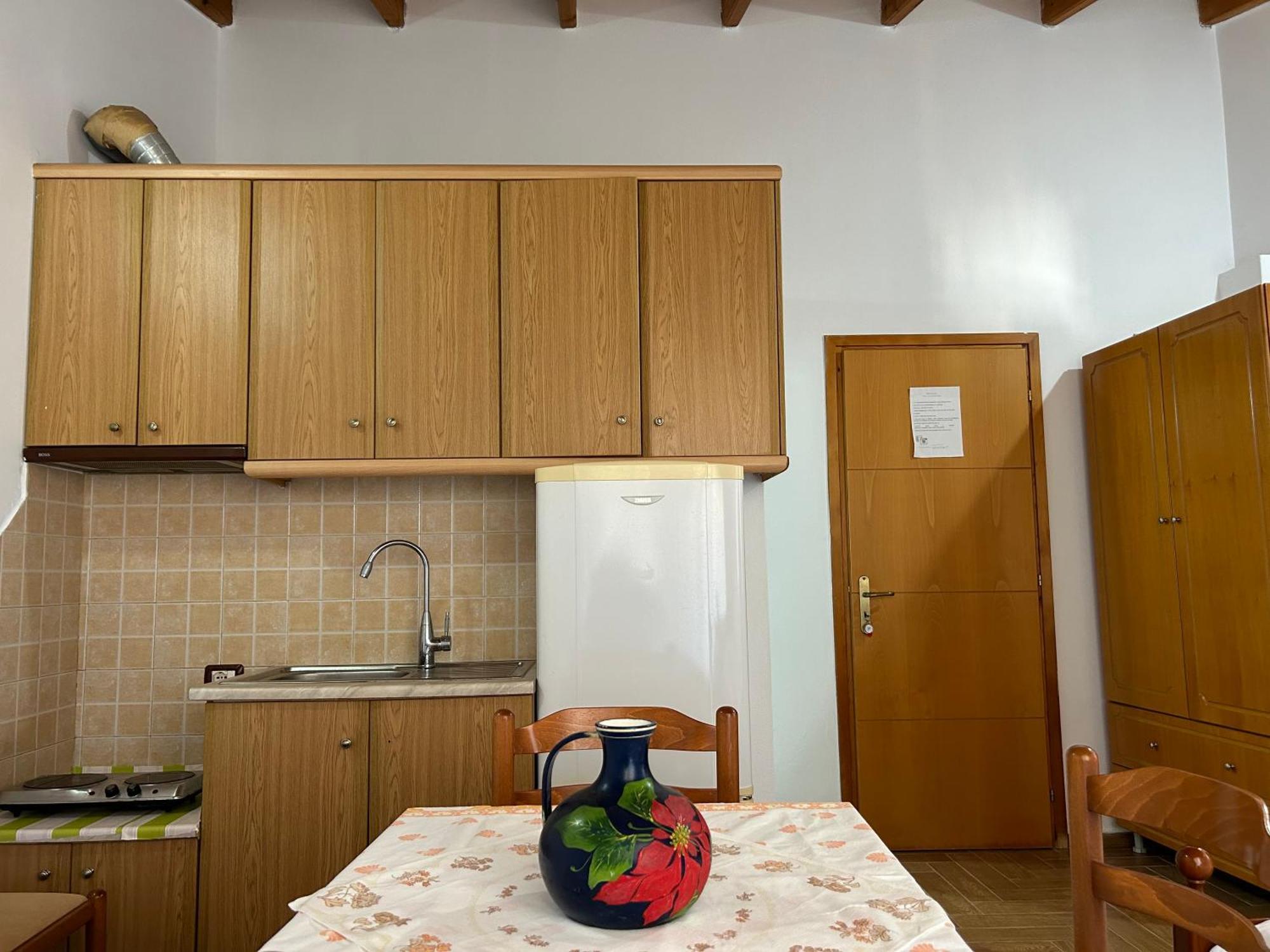 Caushi Apartments Ксамил Экстерьер фото