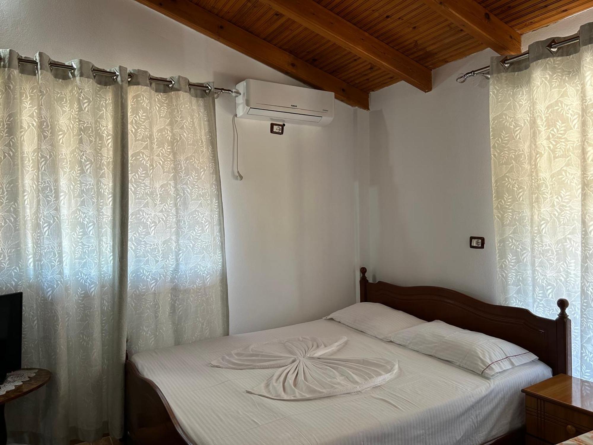 Caushi Apartments Ксамил Экстерьер фото