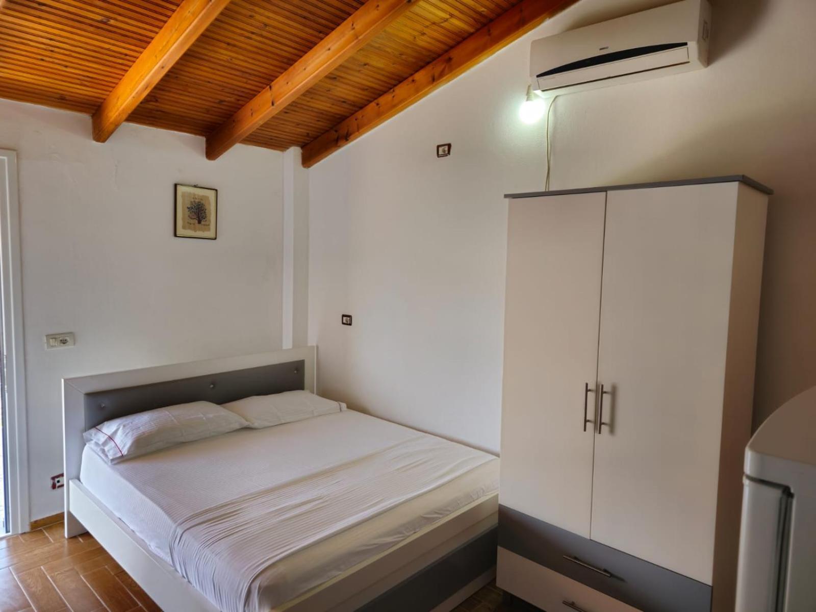 Caushi Apartments Ксамил Экстерьер фото