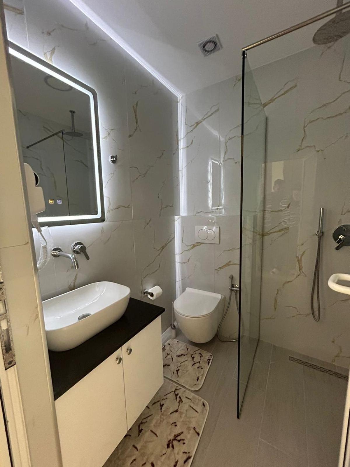 Caushi Apartments Ксамил Экстерьер фото