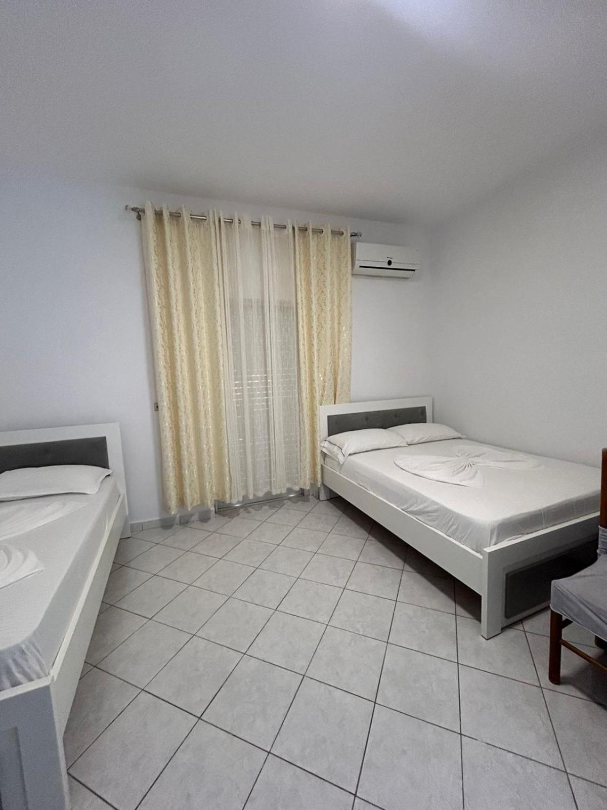 Caushi Apartments Ксамил Экстерьер фото