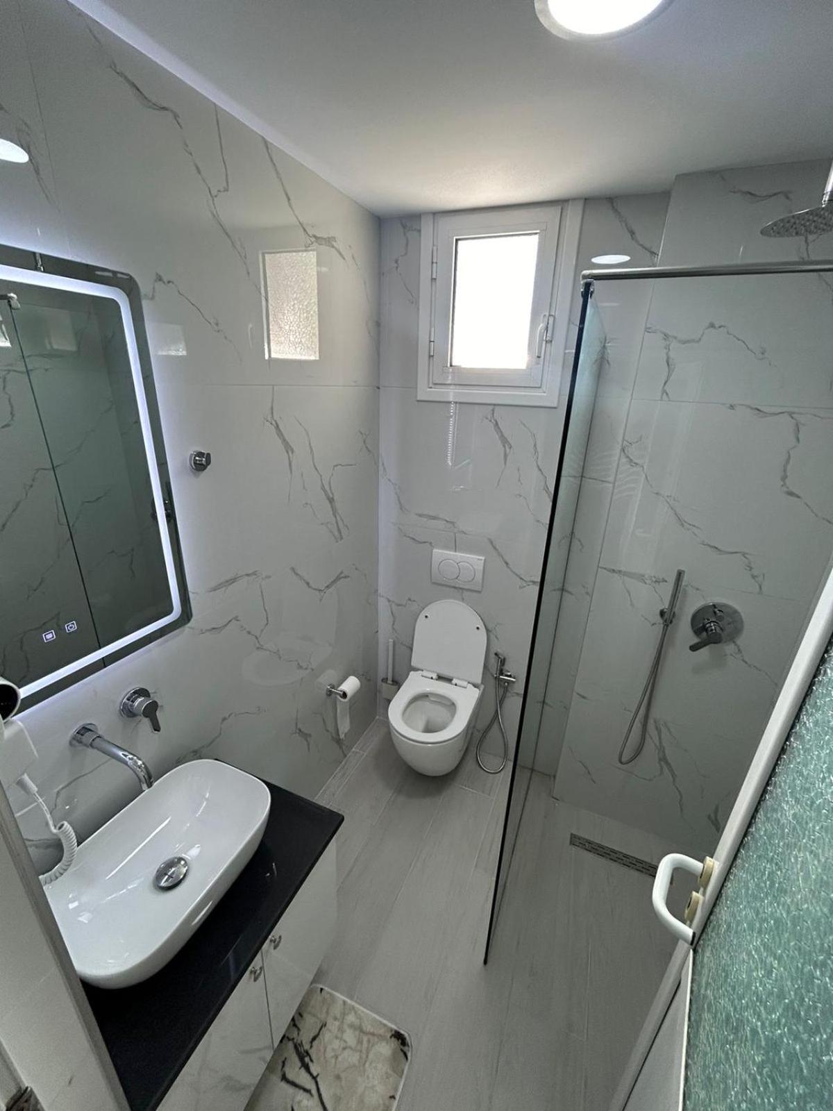 Caushi Apartments Ксамил Экстерьер фото