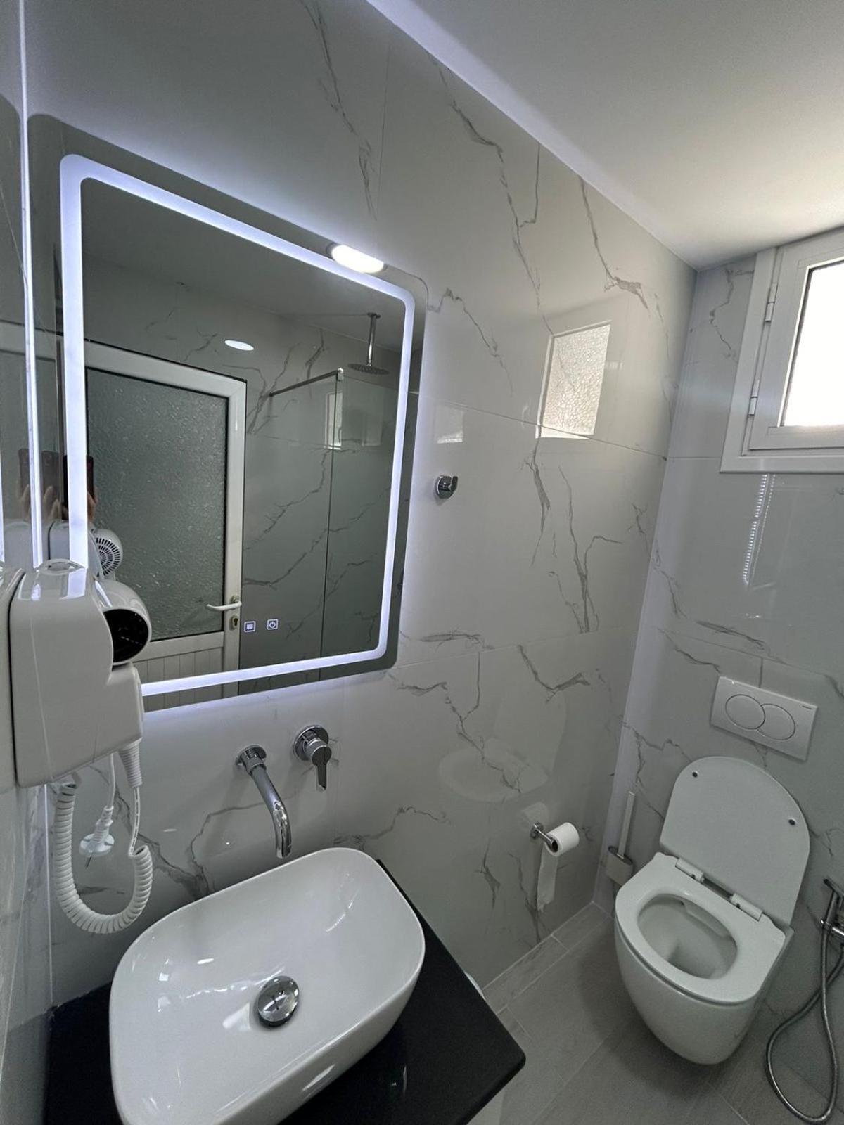 Caushi Apartments Ксамил Экстерьер фото