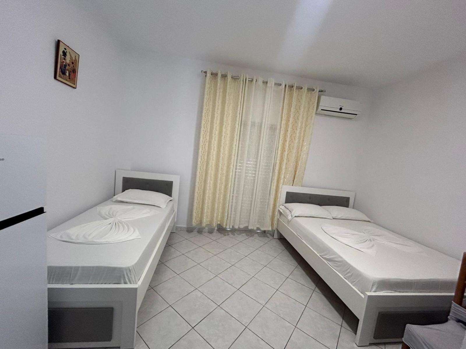 Caushi Apartments Ксамил Экстерьер фото