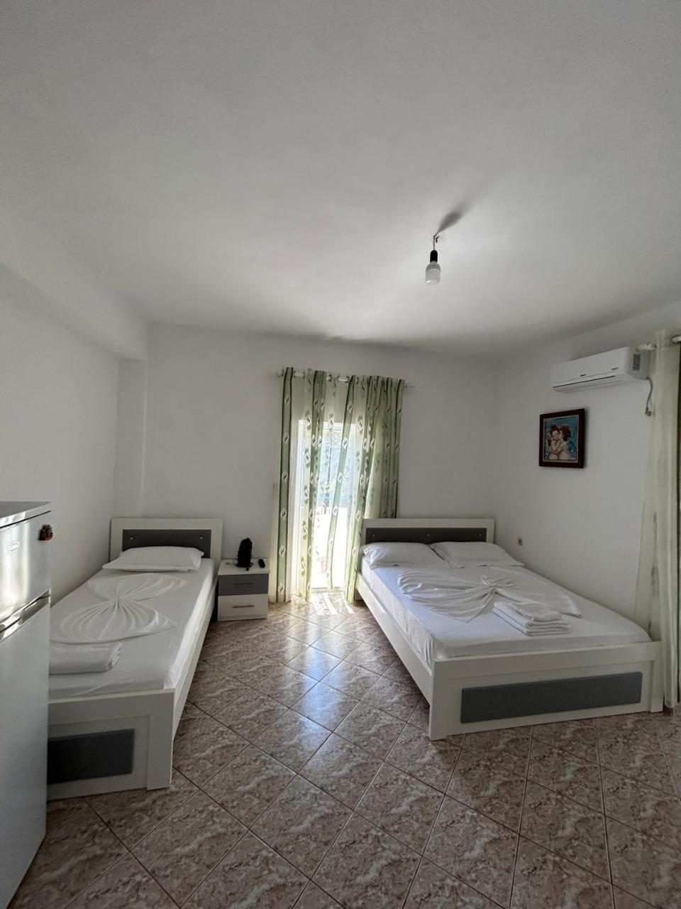 Caushi Apartments Ксамил Экстерьер фото