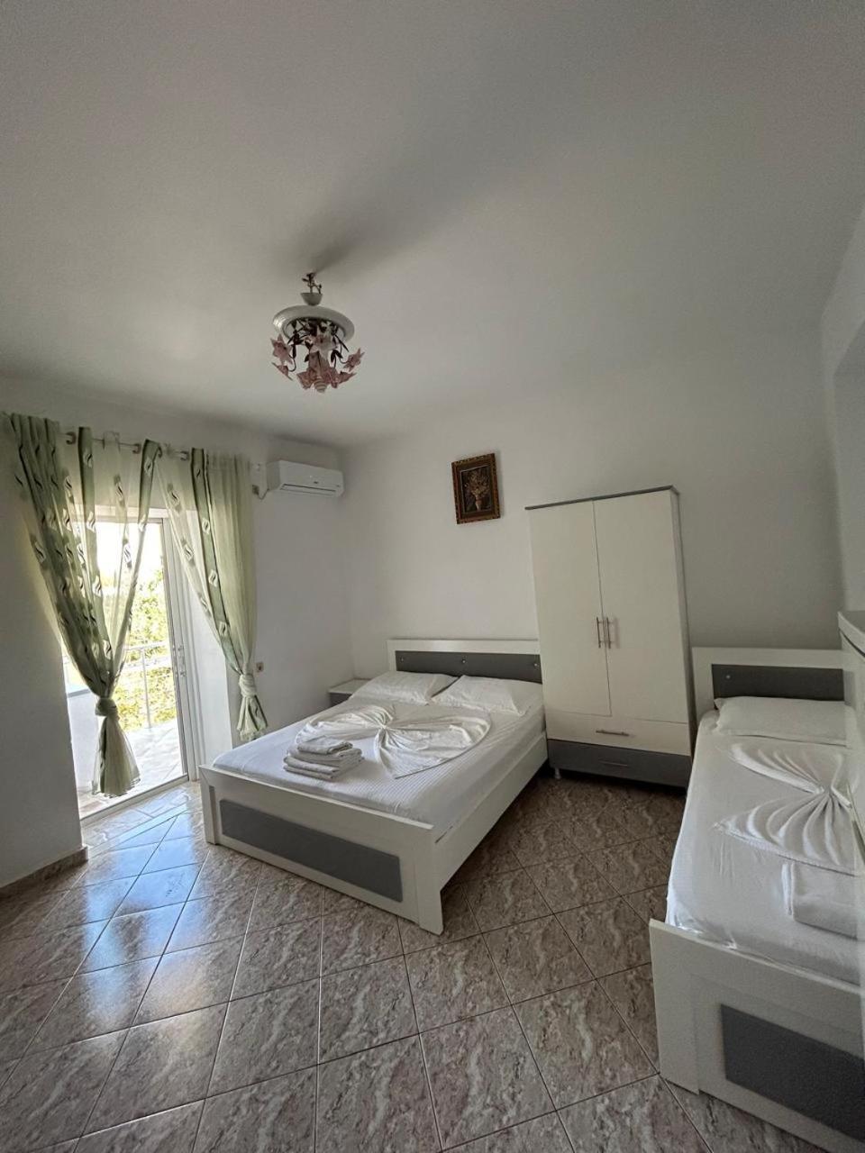 Caushi Apartments Ксамил Экстерьер фото