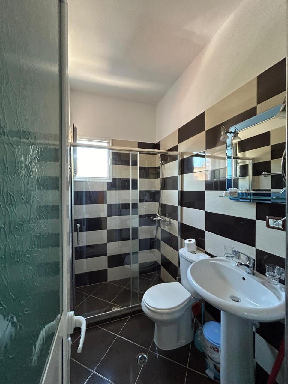 Caushi Apartments Ксамил Экстерьер фото