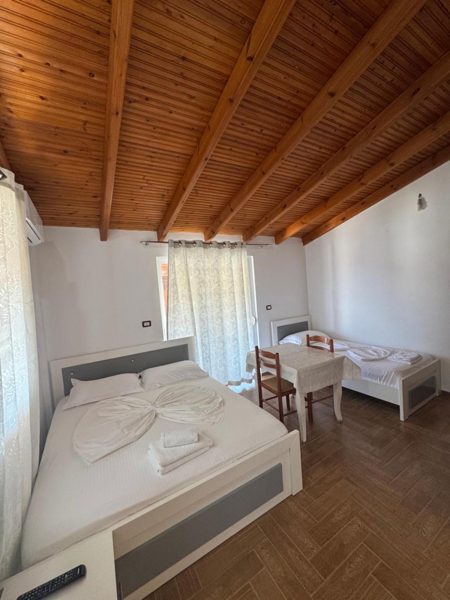 Caushi Apartments Ксамил Экстерьер фото