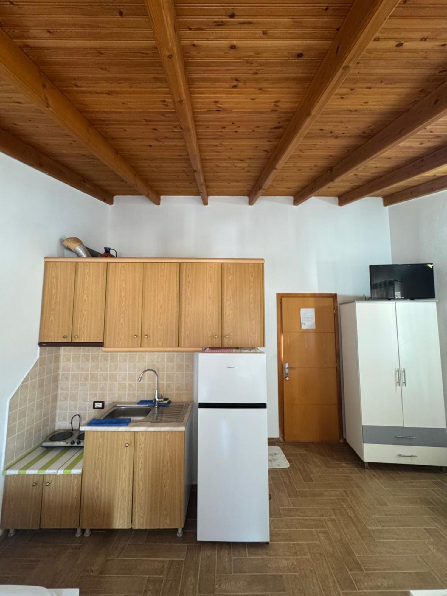 Caushi Apartments Ксамил Экстерьер фото
